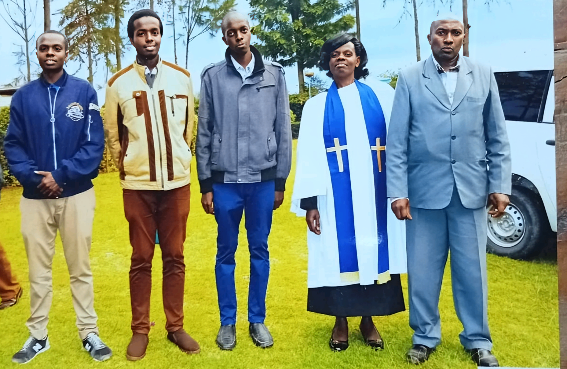 Dr. Eunice Nduta Maina with family in ministerial vestments